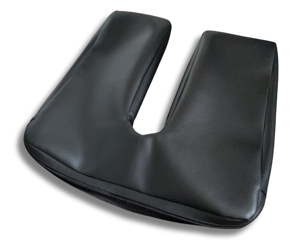 Black faux leather U-shape cushion cover for tailbone and pelvic support, eco-friendly and fluid-resistant with non-slip base