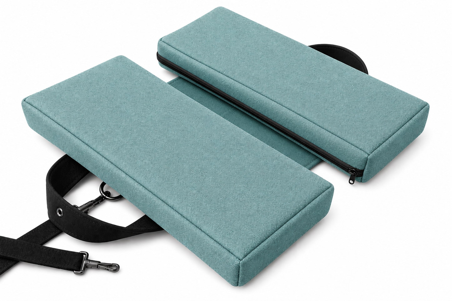 SunCloud Bermuda Green foldable performance travel seat cushion with carrying strap for tailbone and pelvic pain relief.