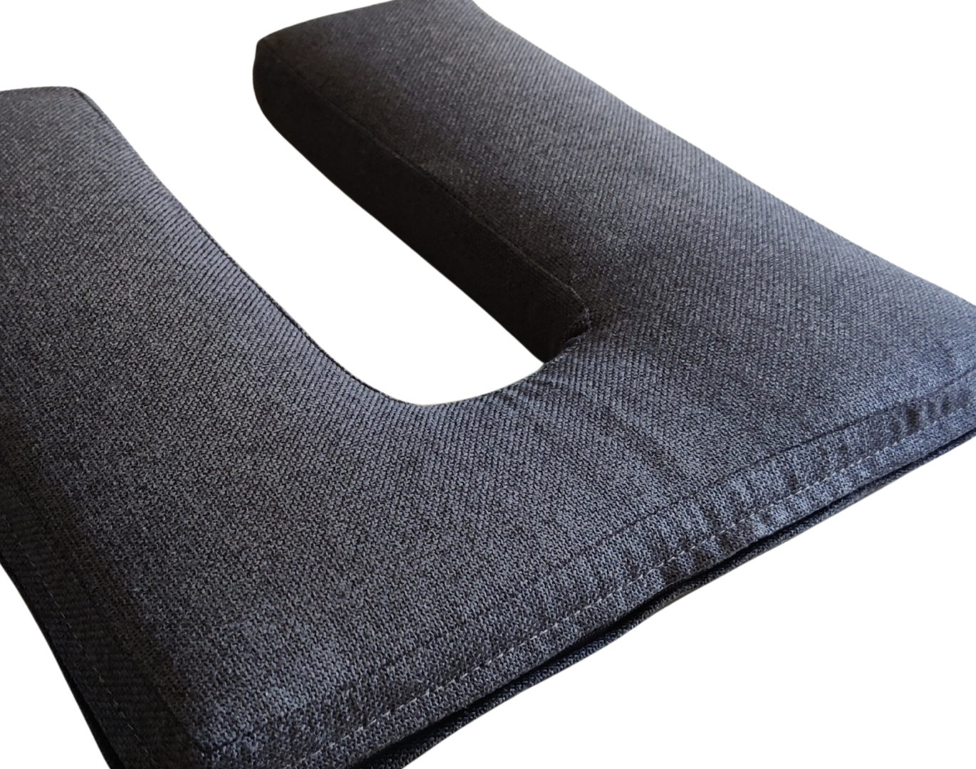SunCloud U-shaped ergonomic seat cushion in breathable black eco-canvas – designed for tailbone and pelvic pain relief.