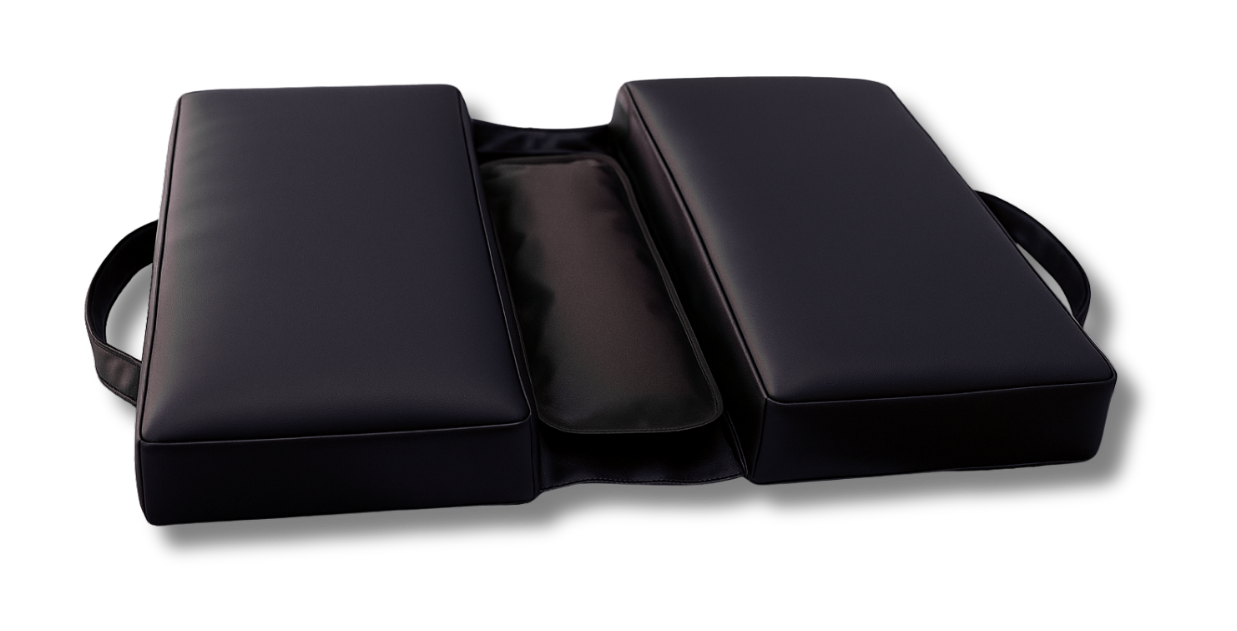 Sandalwood SunCloud® travel cushion with center comfort channel holding a matching black gel therapy pack, displayed on a modern striped table with ergonomic design features.