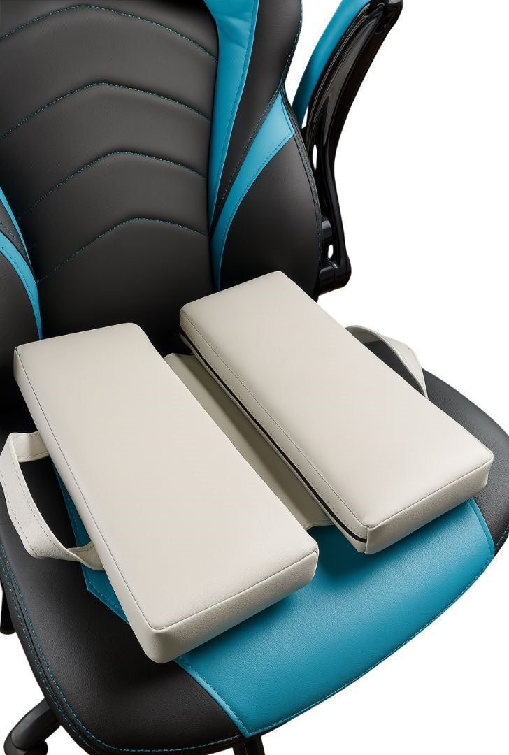 Silver ergonomic seat cushions placed on a black and turquoise office chair for optimal comfort and support.