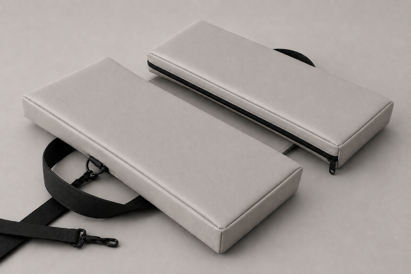 SunCloud foldable travel seat cushion in cement gray displayed for portable ergonomic sitting comfort.