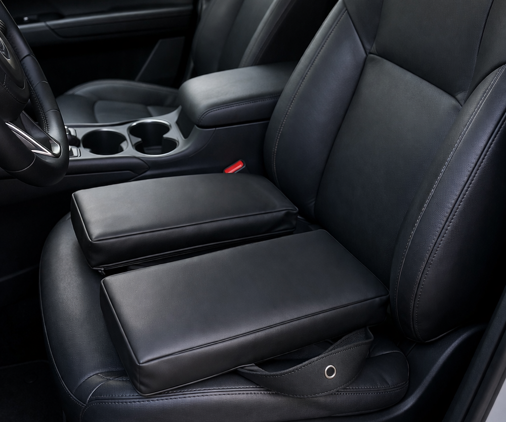 SunCloud® travel seat cushion in black faux leather placed on car seat for pelvic and tailbone pain relief